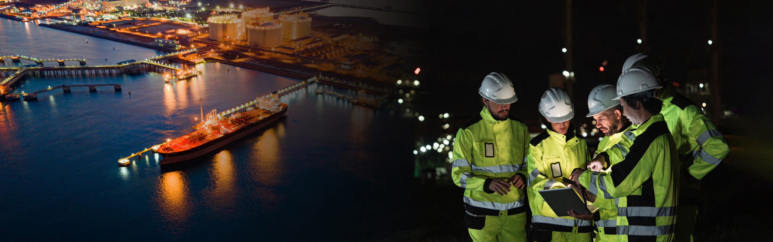 Maritime professionals at a port at night
